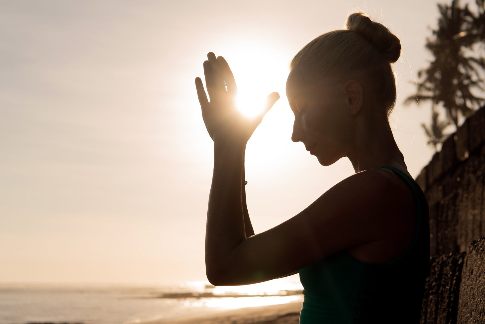 beautiful woman meditating outdoors
